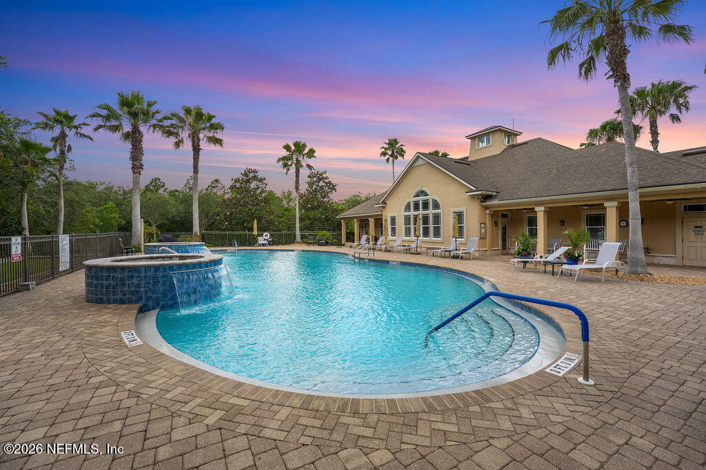 48 Ocale Court St. Augustine, FL 32084 - Photo 44 of 59 a view of a swimming pool with a house