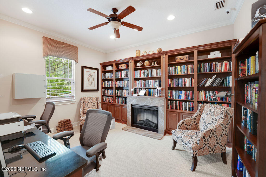 48 Ocale Court St. Augustine, FL 32084 - Photo 49 of 59 a view of a livingroom with furniture and a bookshelf