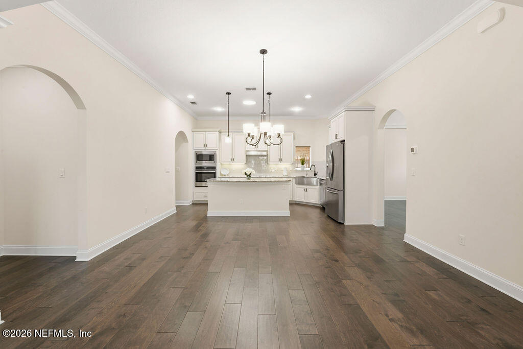 48 Ocale Court St. Augustine, FL 32084 - Photo 7 of 59 a view of a kitchen with wooden floor and a kitchen