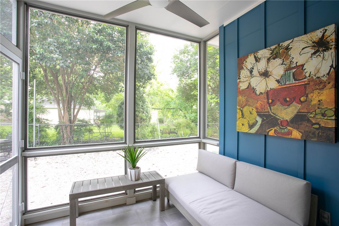 6613 Woodrow Avenue Austin, TX 78757 - Photo 13 of 27 a living room with furniture and a large window
