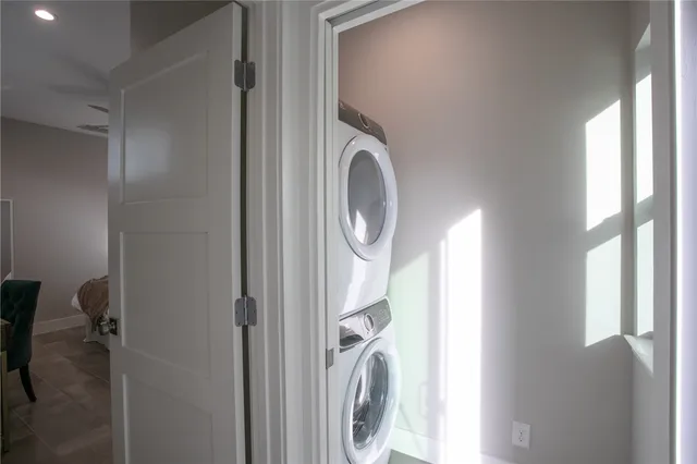 a view of backyard with outdoor seating and plants