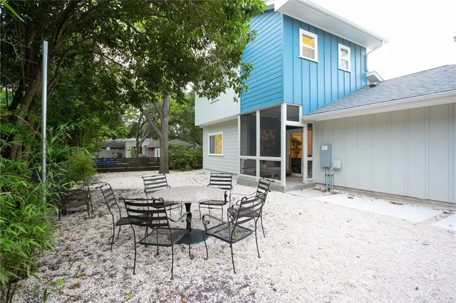 a view of a two chairs in the balcony