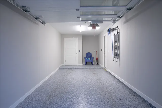 a backyard of a house with outdoor seating