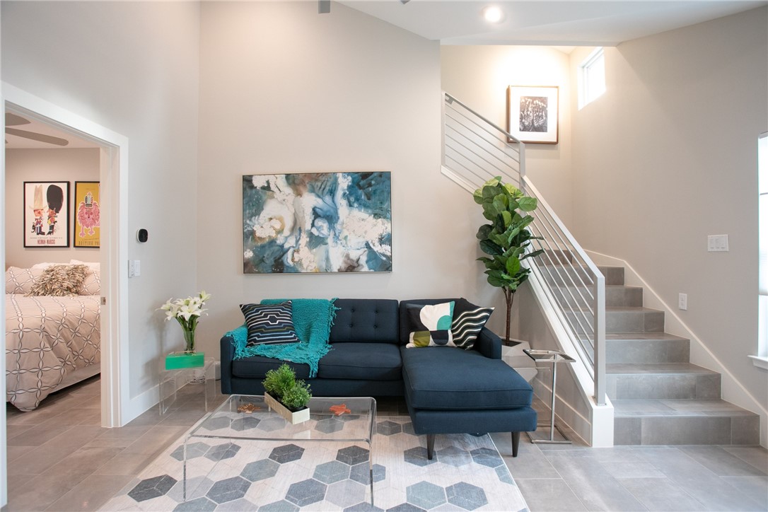 6613 Woodrow Avenue Austin, TX 78757 - Photo 8 of 27 a living room with furniture and a rug