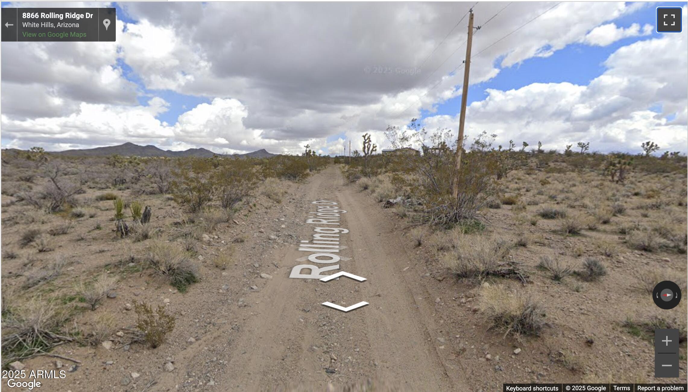 8908 Rolling Ridge Drive, Unit 10 Willow Beach, AZ 86445 - Photo 5 of 8 a view of a city with mountain