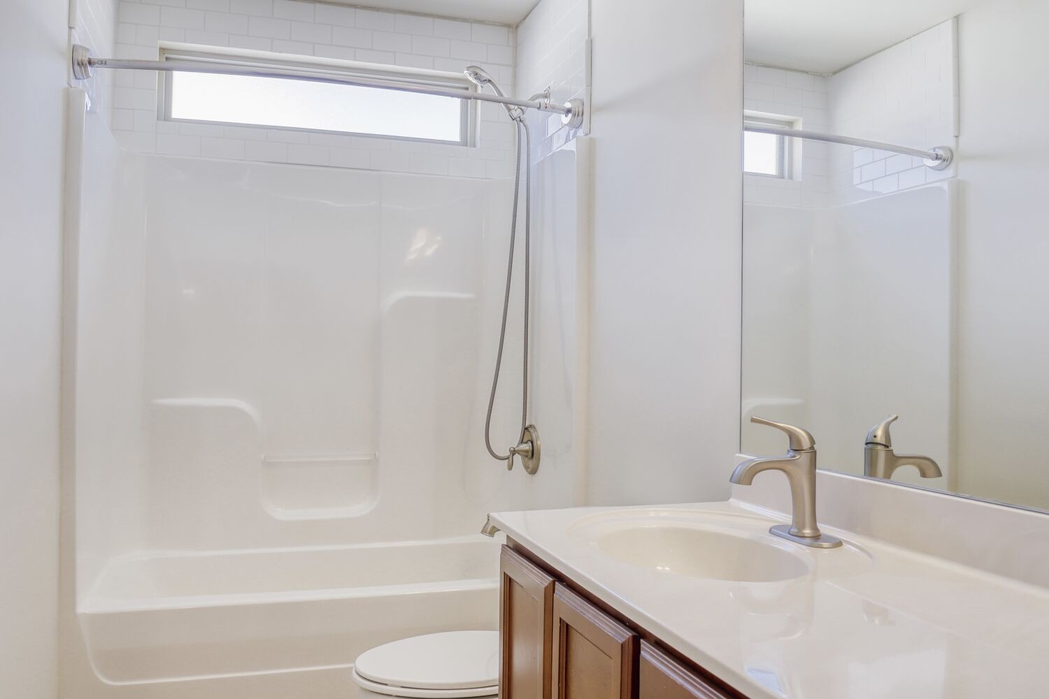 1011 Beverly Lane Spring Hill, TN 37174 - Photo 14 of 20 a bathroom with a sink toilet and shower