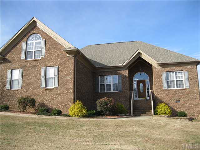 1109 Golden Grain Road Garner, NC 27529 - Photo 1 of 25 a front view of a house with a yard