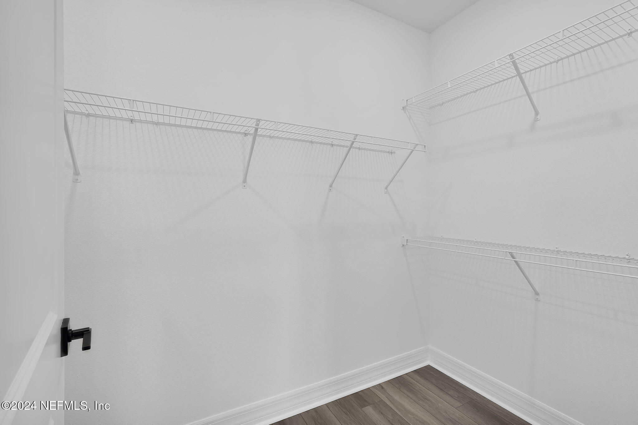 835 Continuum Loop Yulee, FL 32097 - Photo 27 of 54 Prosperity Owner's Walk-In Closet