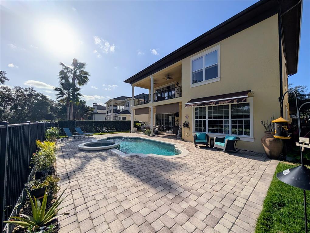 7429 Gathering Court Reunion, FL 34747 - Photo 22 of 40 a view of a house with backyard porch and sitting area