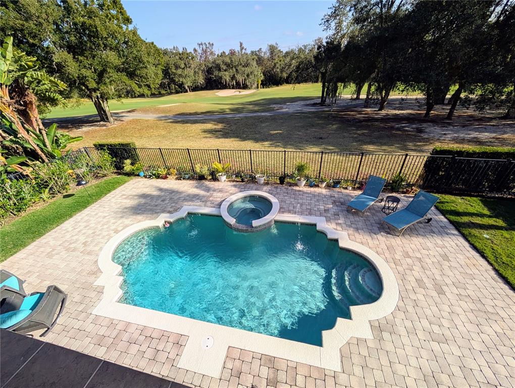 7429 Gathering Court Reunion, FL 34747 - Photo 37 of 40 a view of a backyard with table and chairs