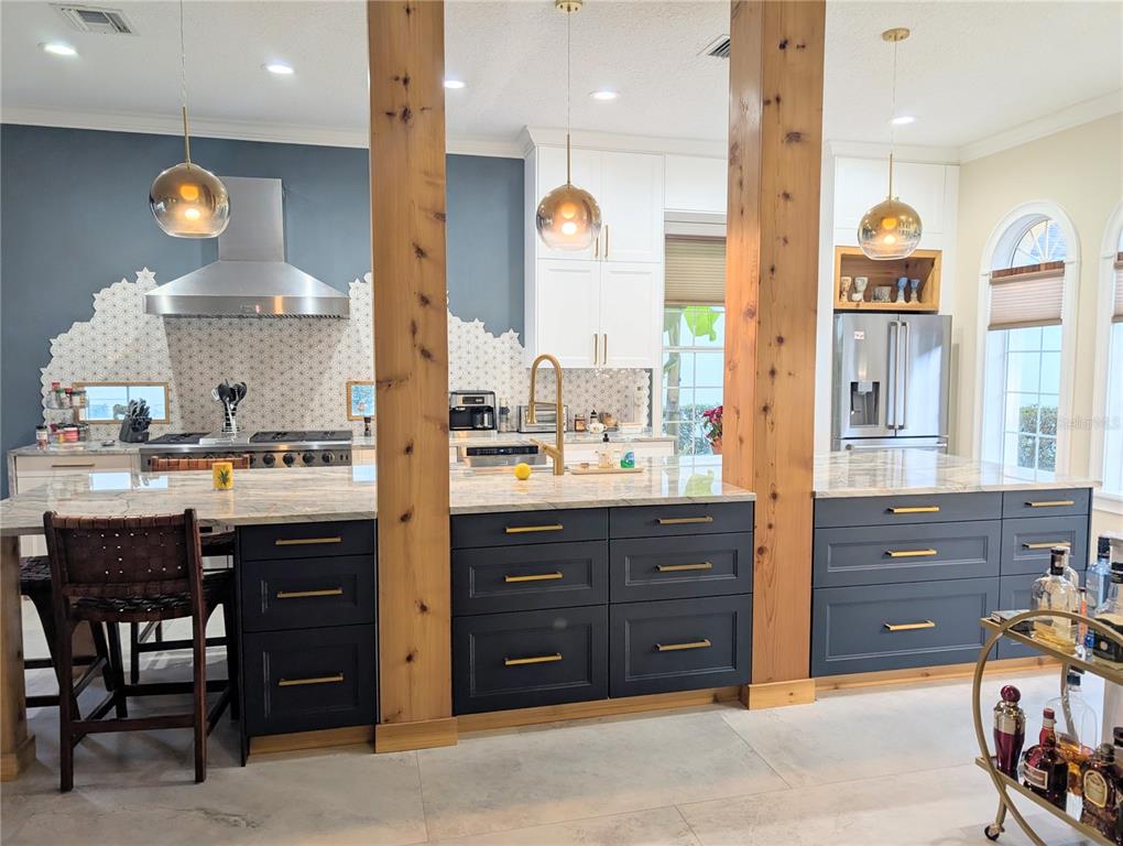 7429 Gathering Court Reunion, FL 34747 - Photo 4 of 40 a kitchen with a sink and cabinets