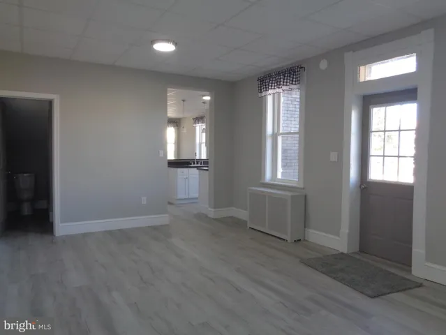 a view of a room with racks on the wall