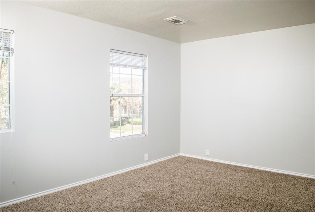 2038 Rustling Trees Way Spring, TX 77373 - Photo 13 of 20 an empty room with windows