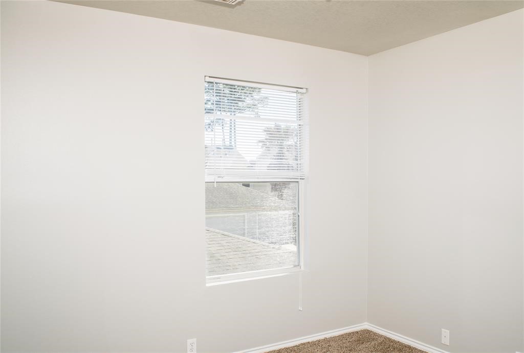 2038 Rustling Trees Way Spring, TX 77373 - Photo 19 of 20 a view of a small space with window in it