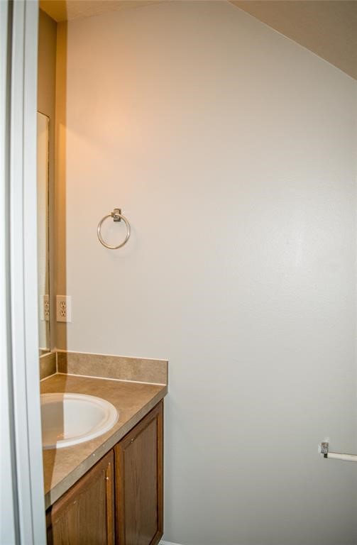 2038 Rustling Trees Way Spring, TX 77373 - Photo 6 of 20 a bathroom with a sink and a mirror
