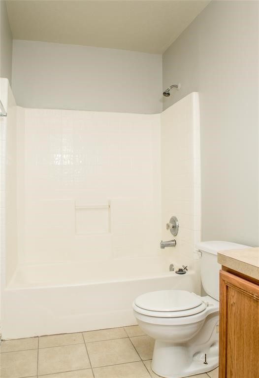 2038 Rustling Trees Way Spring, TX 77373 - Photo 10 of 20 a bathroom with a toilet and a shower