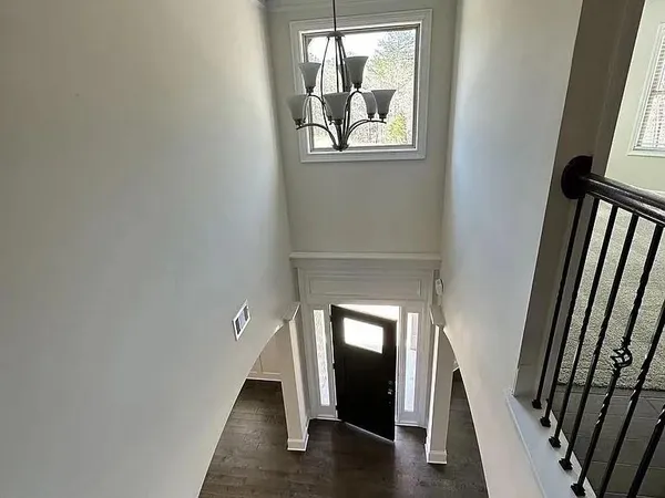 a view of entryway with wooden floor