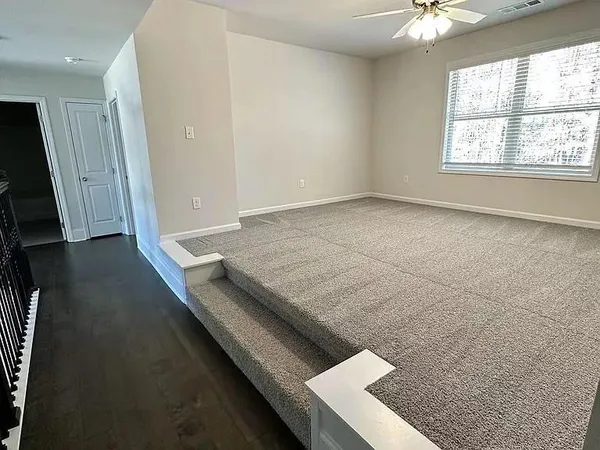 an empty room with windows