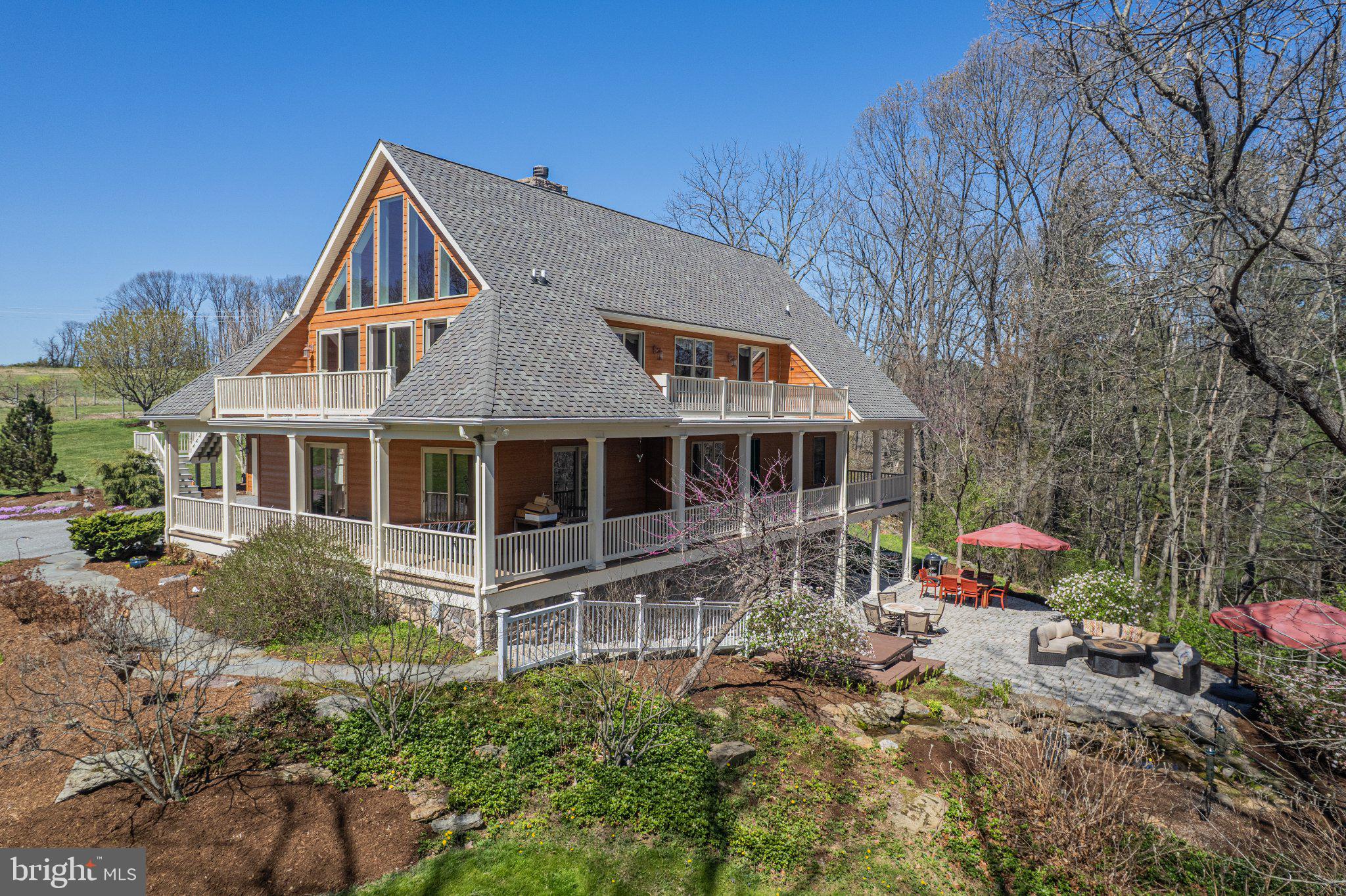 21042 Millers Mill Road Freeland, MD 21053 - Photo 11 of 122 a front view of house with yard and trees around