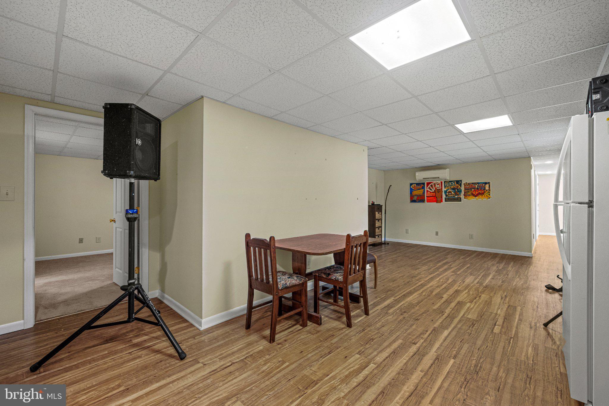 21042 Millers Mill Road Freeland, MD 21053 - Photo 114 of 122 a view of a dining room with furniture and wooden floor