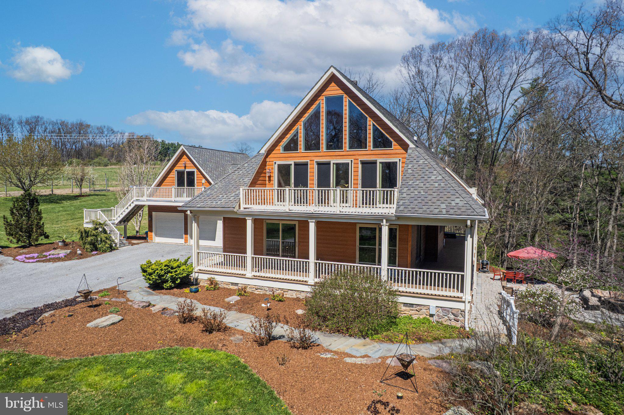 21042 Millers Mill Road Freeland, MD 21053 - Photo 24 of 122 a front view of a house with garden