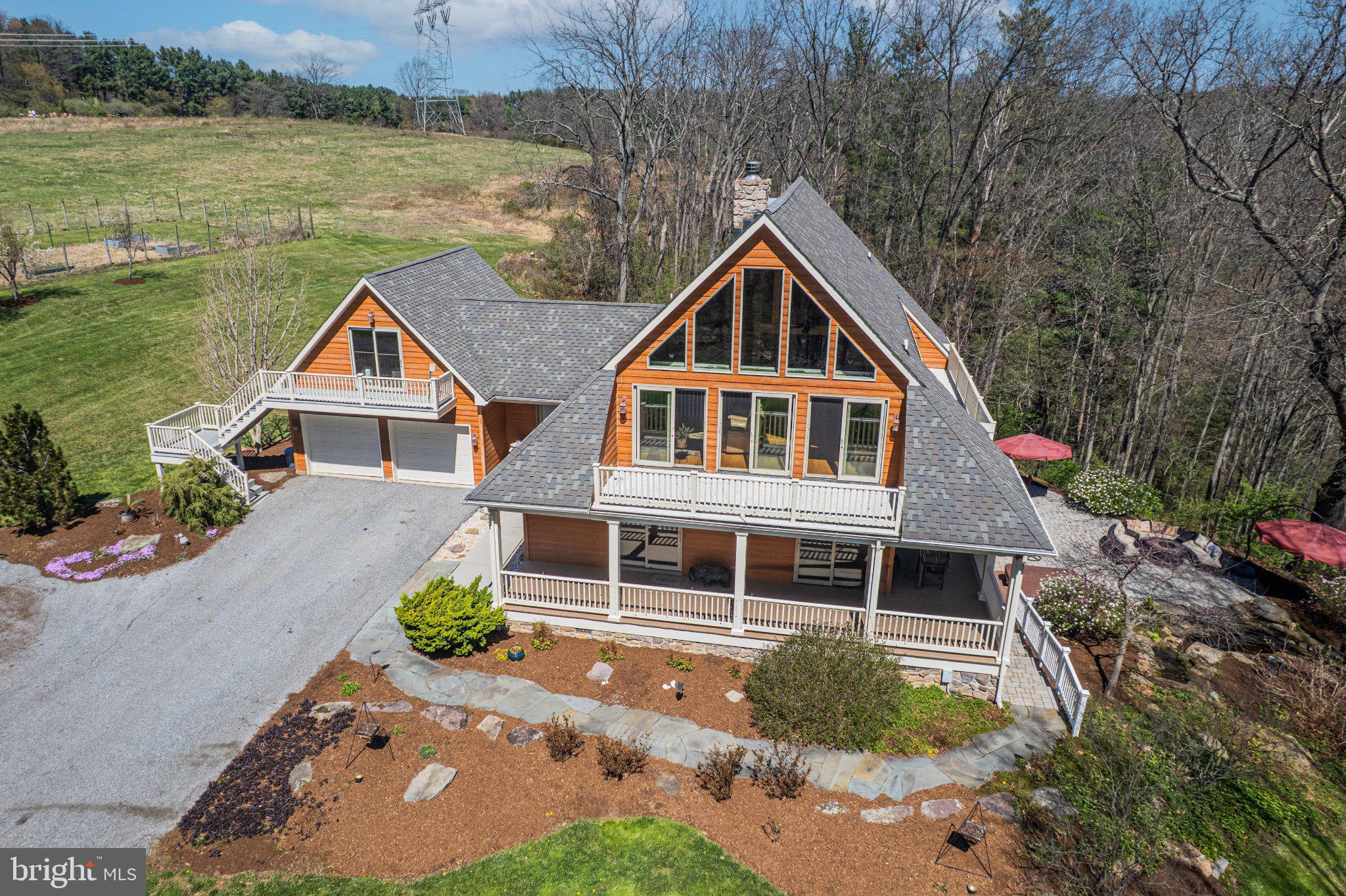 21042 Millers Mill Road Freeland, MD 21053 - Photo 28 of 122 a front view of a house with a yard and lake view
