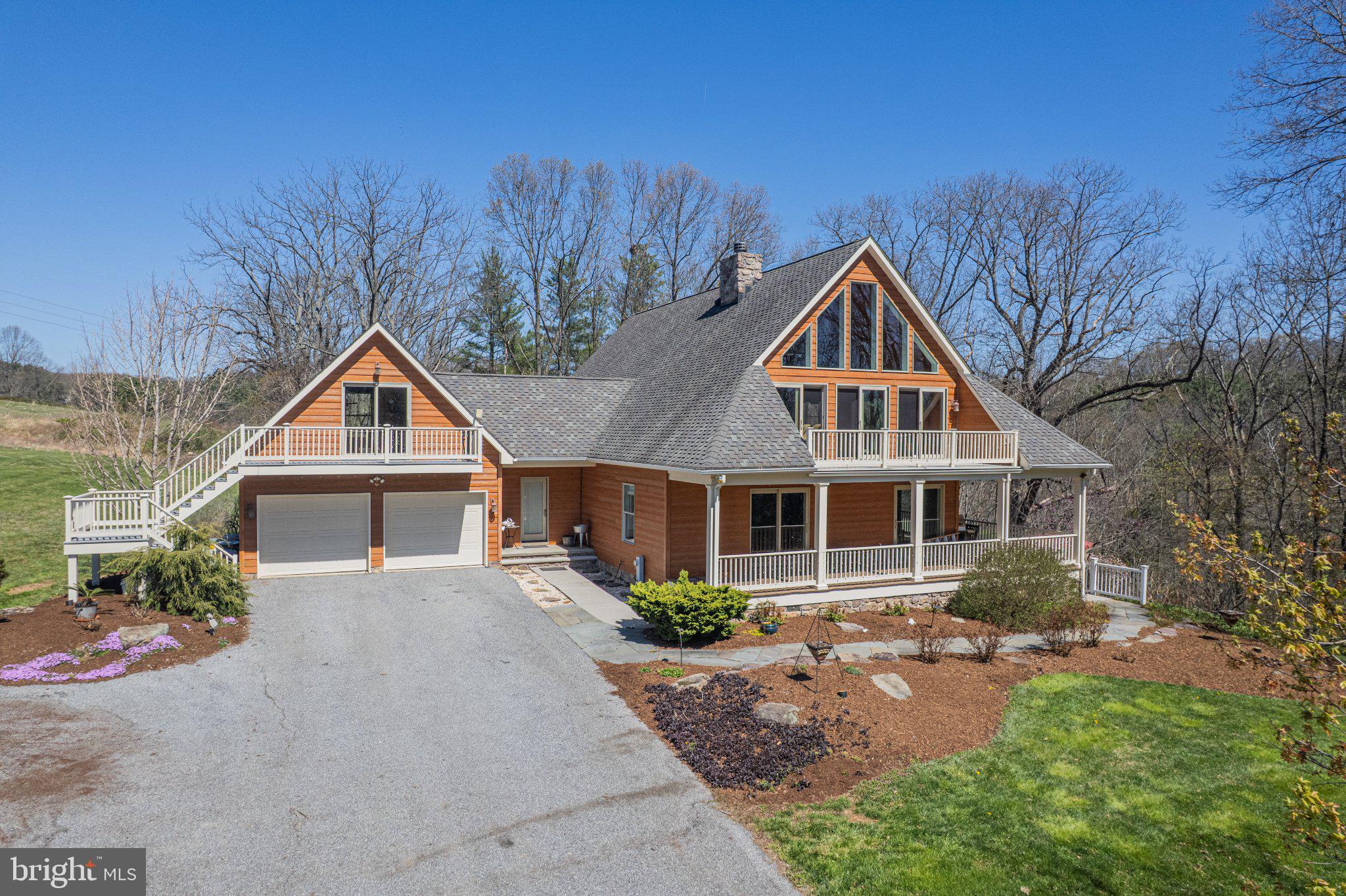21042 Millers Mill Road Freeland, MD 21053 - Photo 34 of 122 a front view of a house with yard and green space
