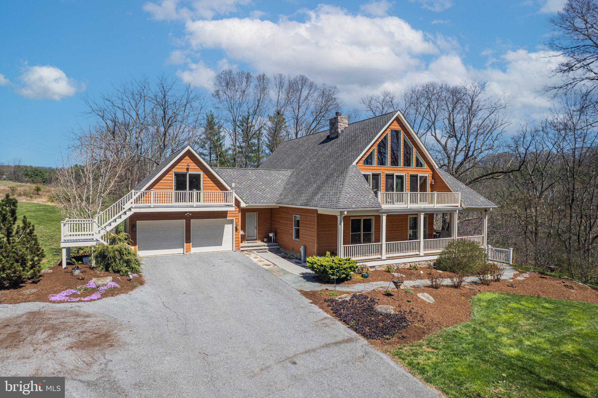 21042 Millers Mill Road Freeland, MD 21053 - Photo 35 of 122 a front view of a house with a yard and trees