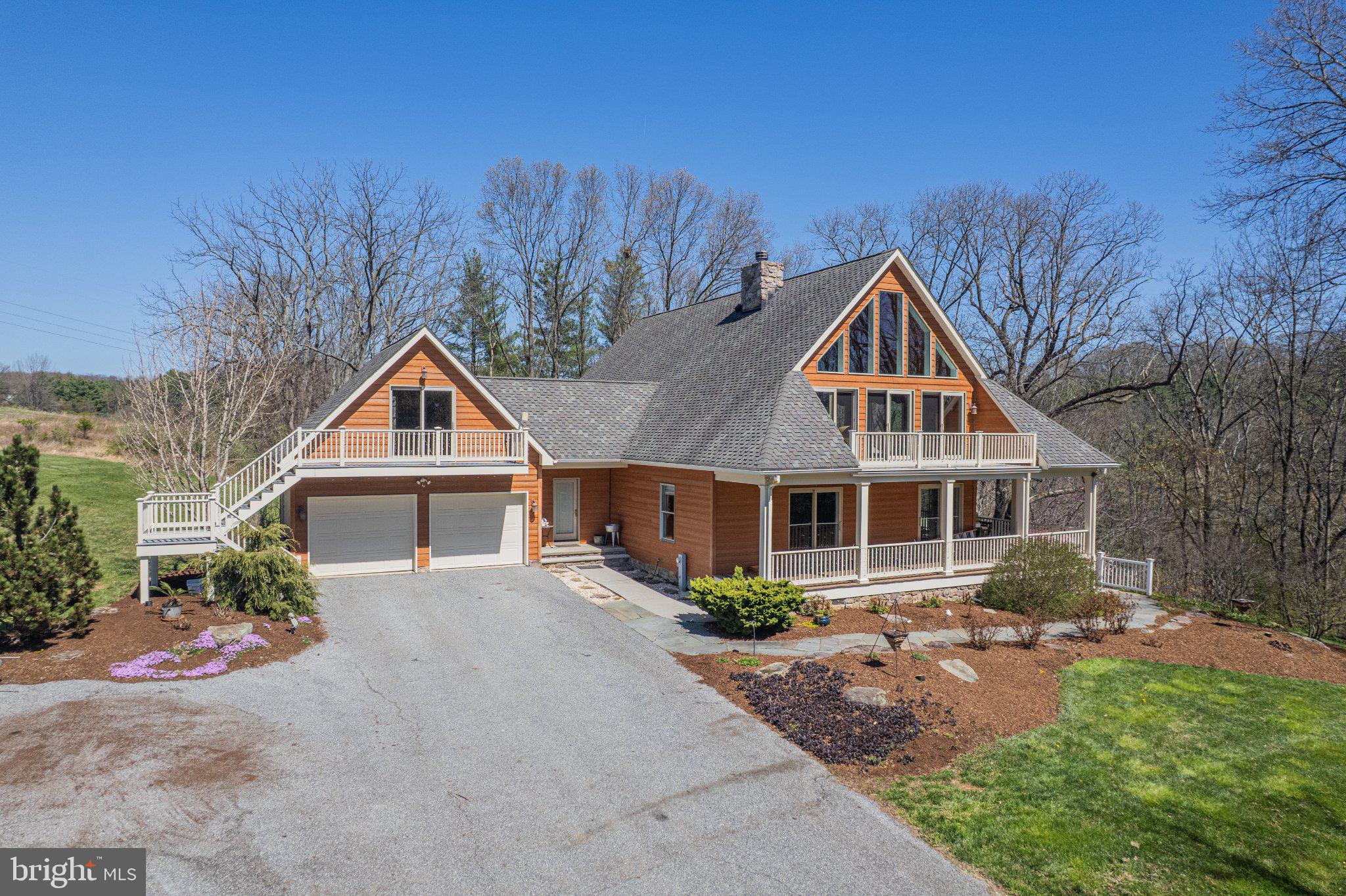 21042 Millers Mill Road Freeland, MD 21053 - Photo 37 of 122 a front view of a house with a yard and trees