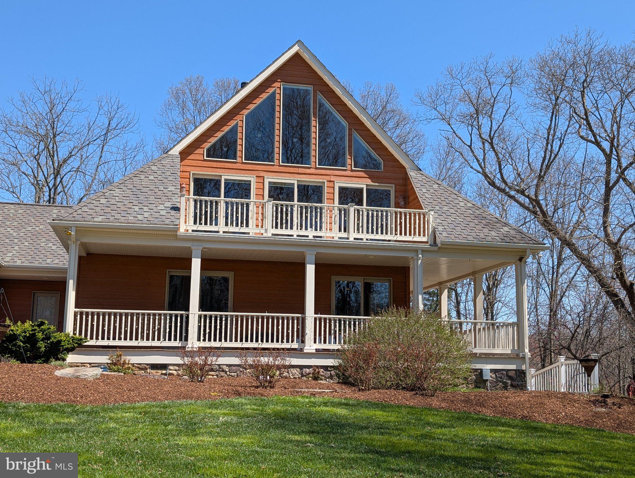 21042 Millers Mill Road Freeland, MD 21053 - Photo 4 of 122 a front view of a house with a yard