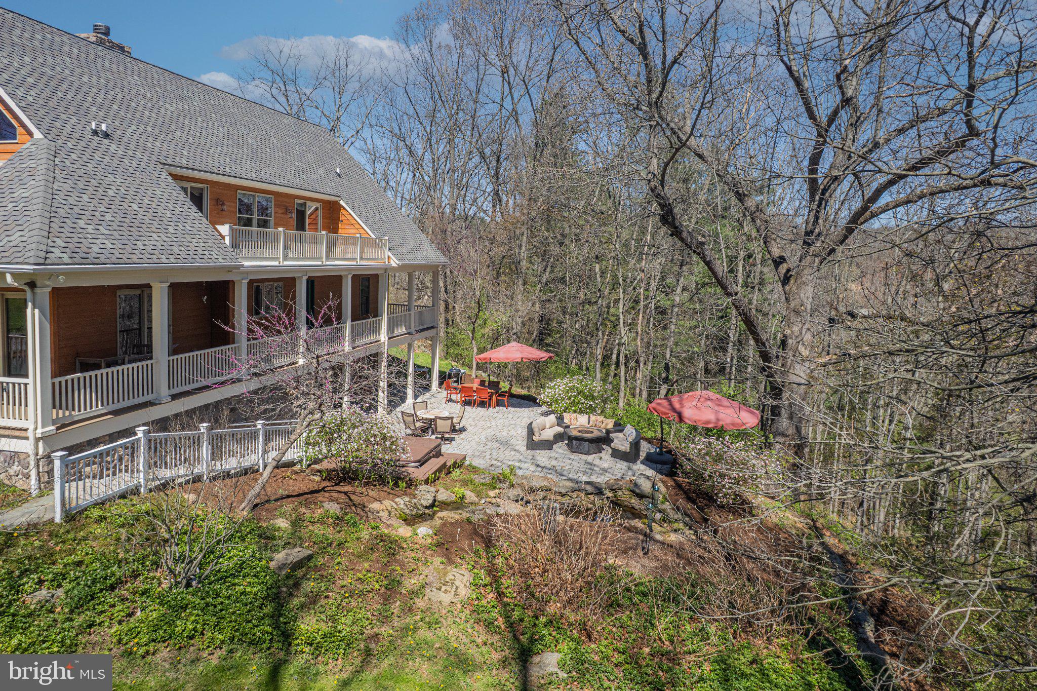 21042 Millers Mill Road Freeland, MD 21053 - Photo 50 of 122 a backyard of a house with table and chairs