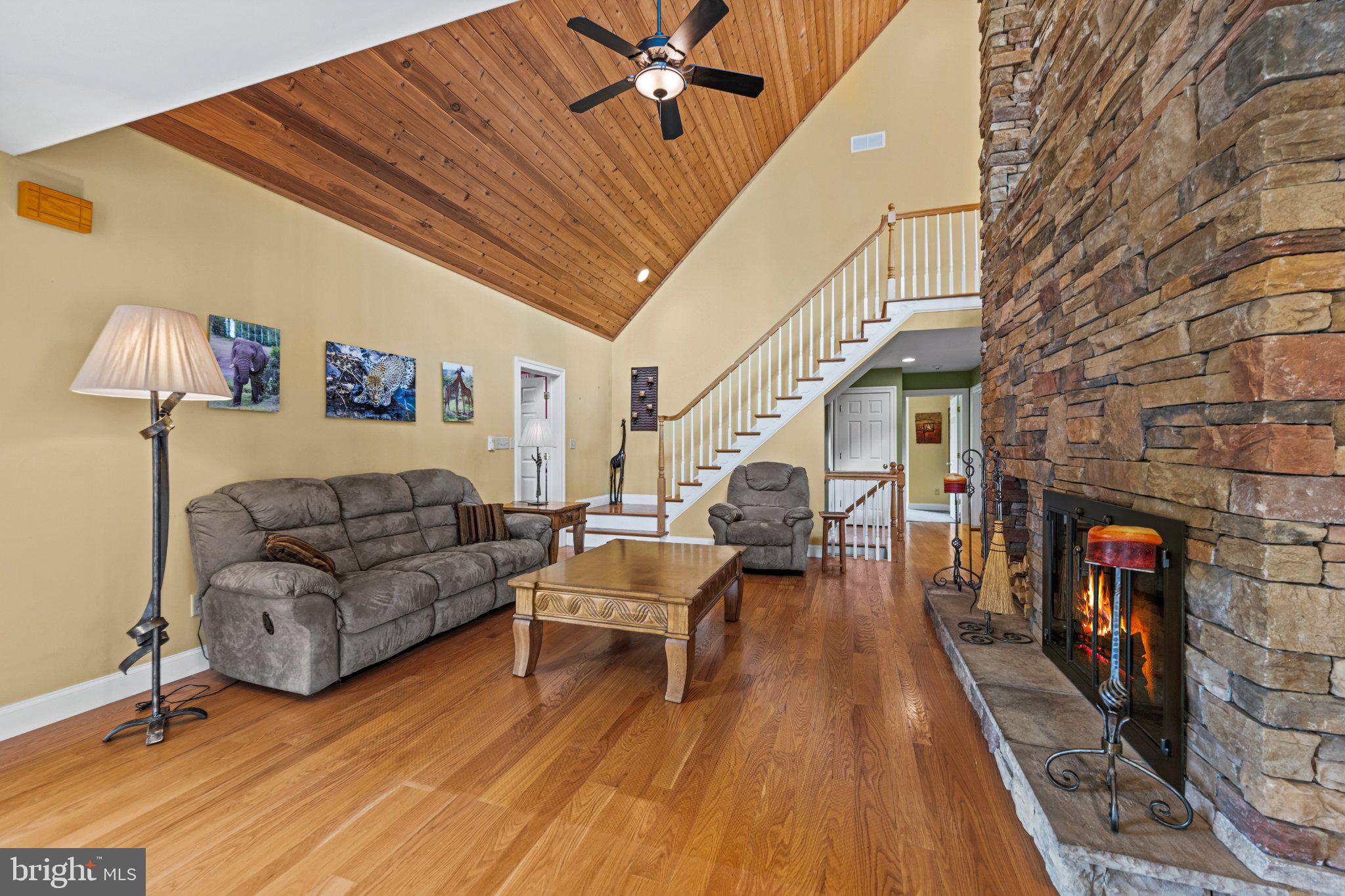 21042 Millers Mill Road Freeland, MD 21053 - Photo 73 of 122 a living room with furniture and a fireplace