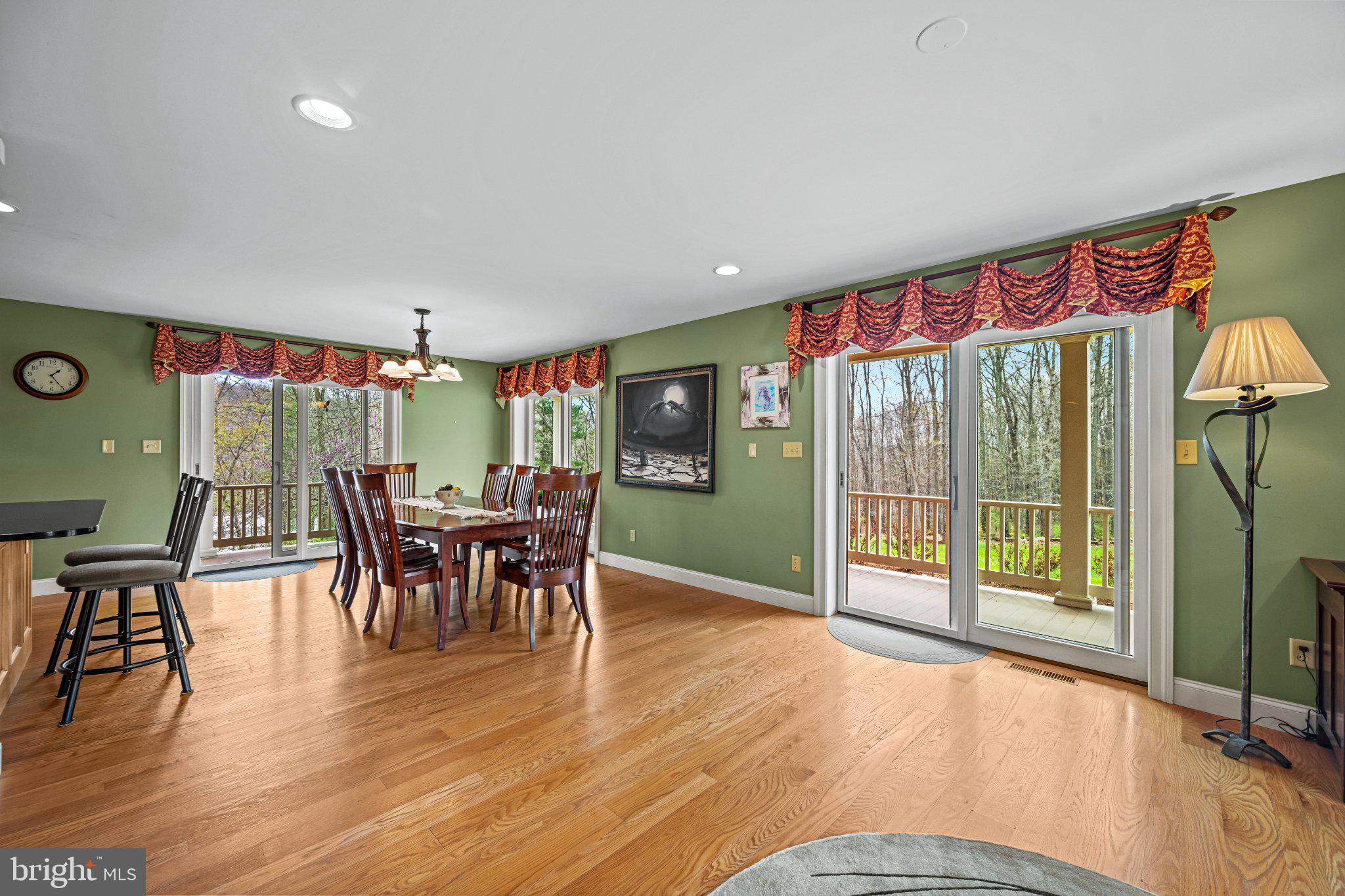 21042 Millers Mill Road Freeland, MD 21053 - Photo 80 of 122 a view of a dining room with furniture window and wooden floor
