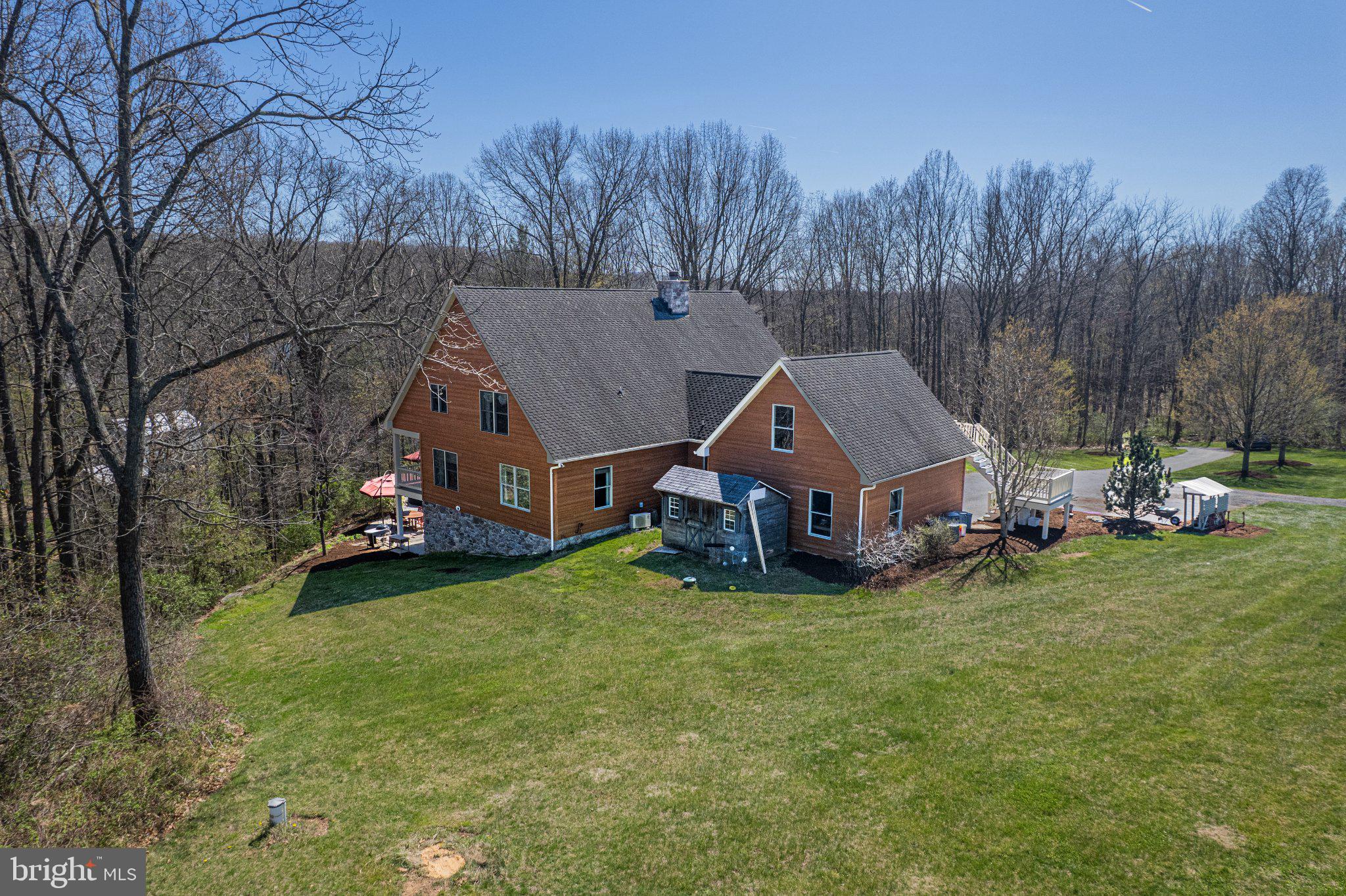 21042 Millers Mill Road Freeland, MD 21053 - Photo 8 of 122 a aerial view of a house with garden