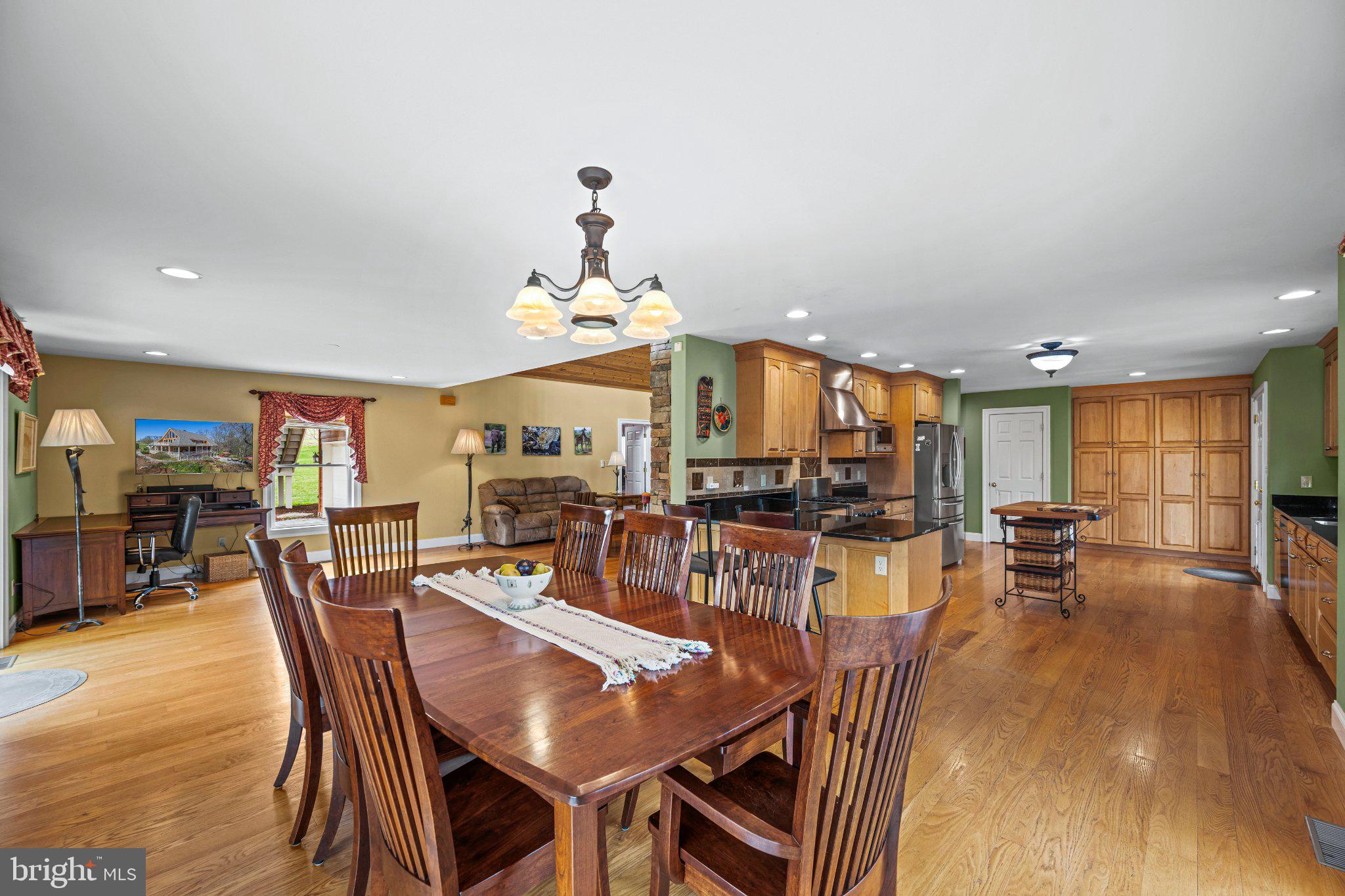 21042 Millers Mill Road Freeland, MD 21053 - Photo 81 of 122 a view of a dining room with furniture window and wooden floor