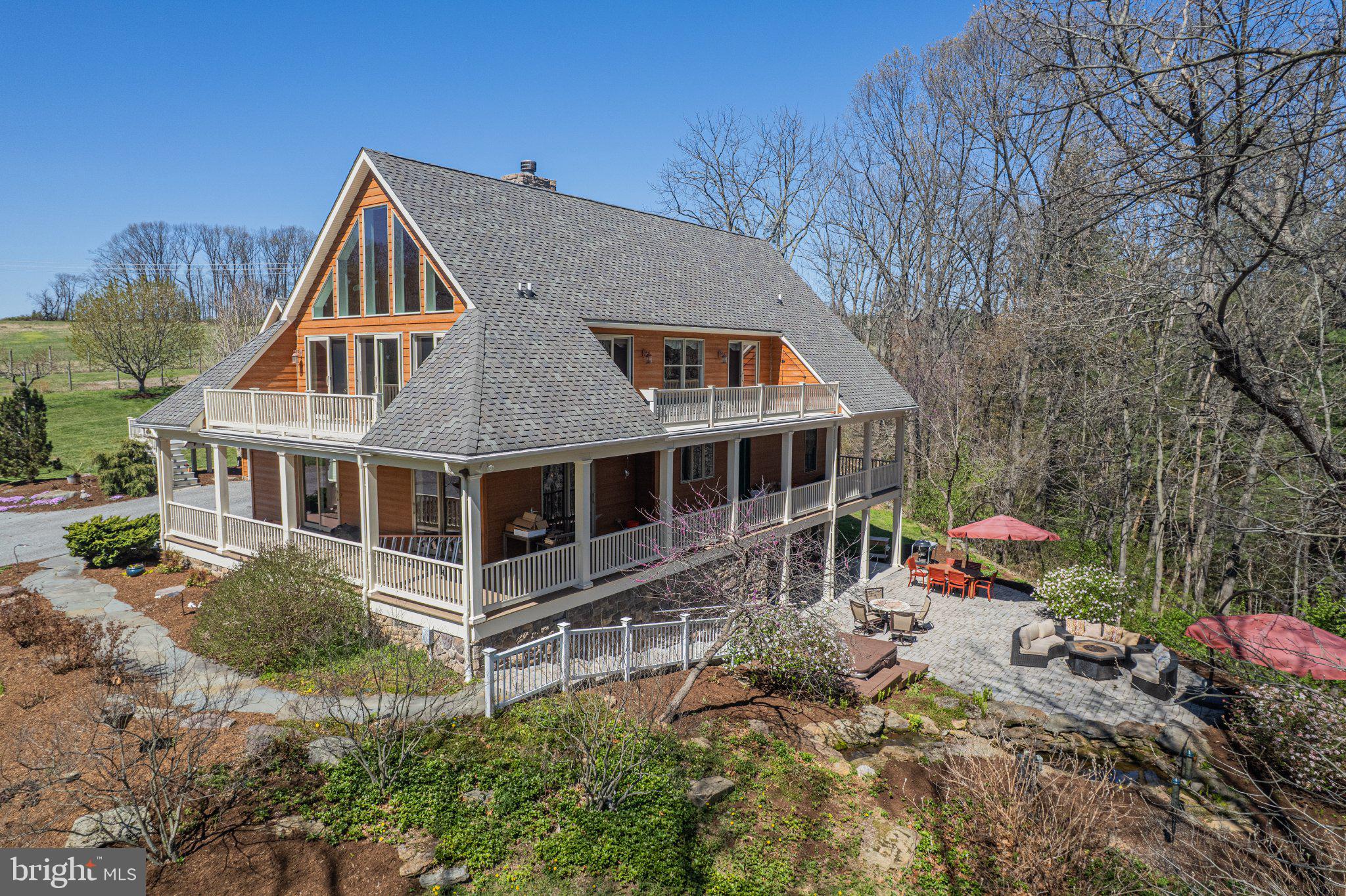 21042 Millers Mill Road Freeland, MD 21053 - Photo 9 of 122 a aerial view of a house with yard and sitting area