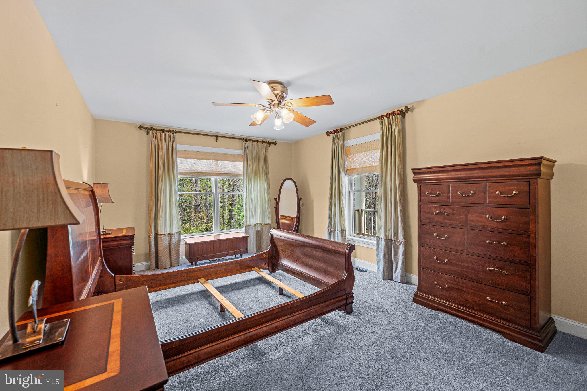 21042 Millers Mill Road Freeland, MD 21053 - Photo 93 of 122 a living room with furniture and a flat screen tv