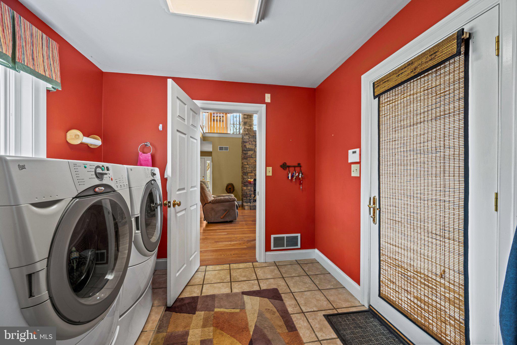21042 Millers Mill Road Freeland, MD 21053 - Photo 96 of 122 Bright laundry room with vibrant accents.