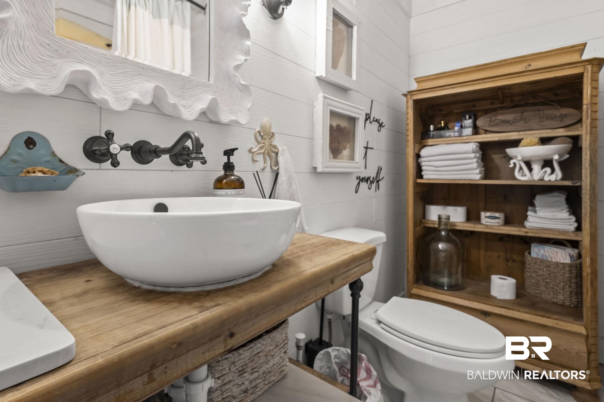 2514 Muscogee Road Gulf Shores, AL 36542 - Photo 34 of 60 Bathroom with toilet, wooden walls, and sink