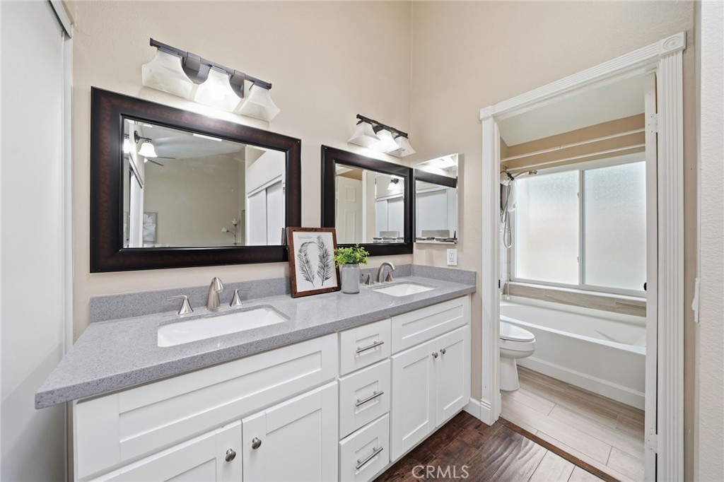 259 Scenic Way Brea, CA 92821 - Photo 32 of 62 a bathroom with a double vanity sink and a mirror