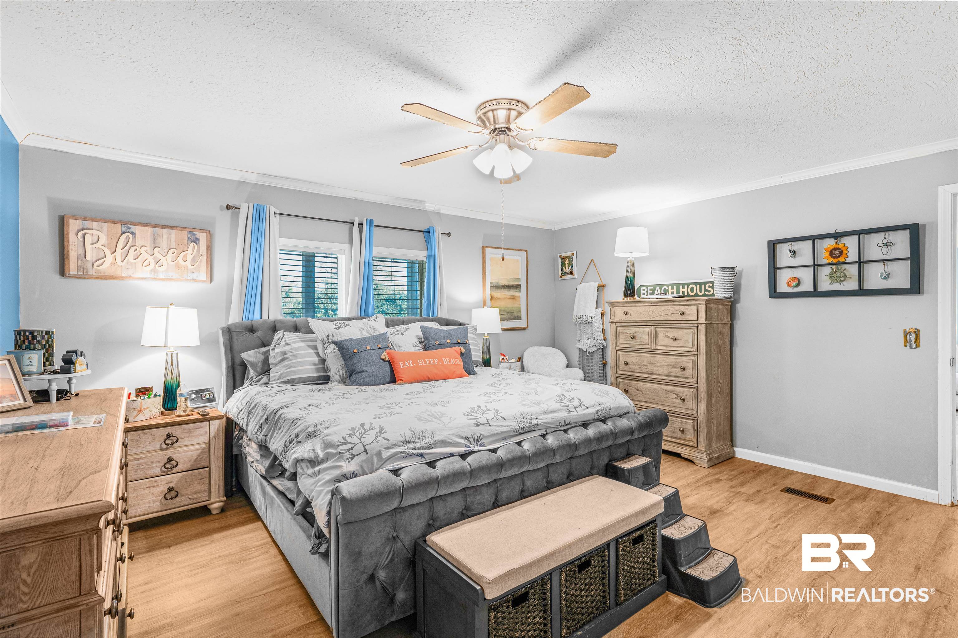 6921 Piney Woods Road Foley, AL 36535 - Photo 16 of 44 Bedroom featuring ceiling fan, ornamental molding, a textured ceiling, and light wood-type flooring