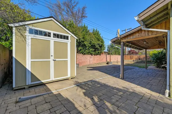 a view of a backyard of a house