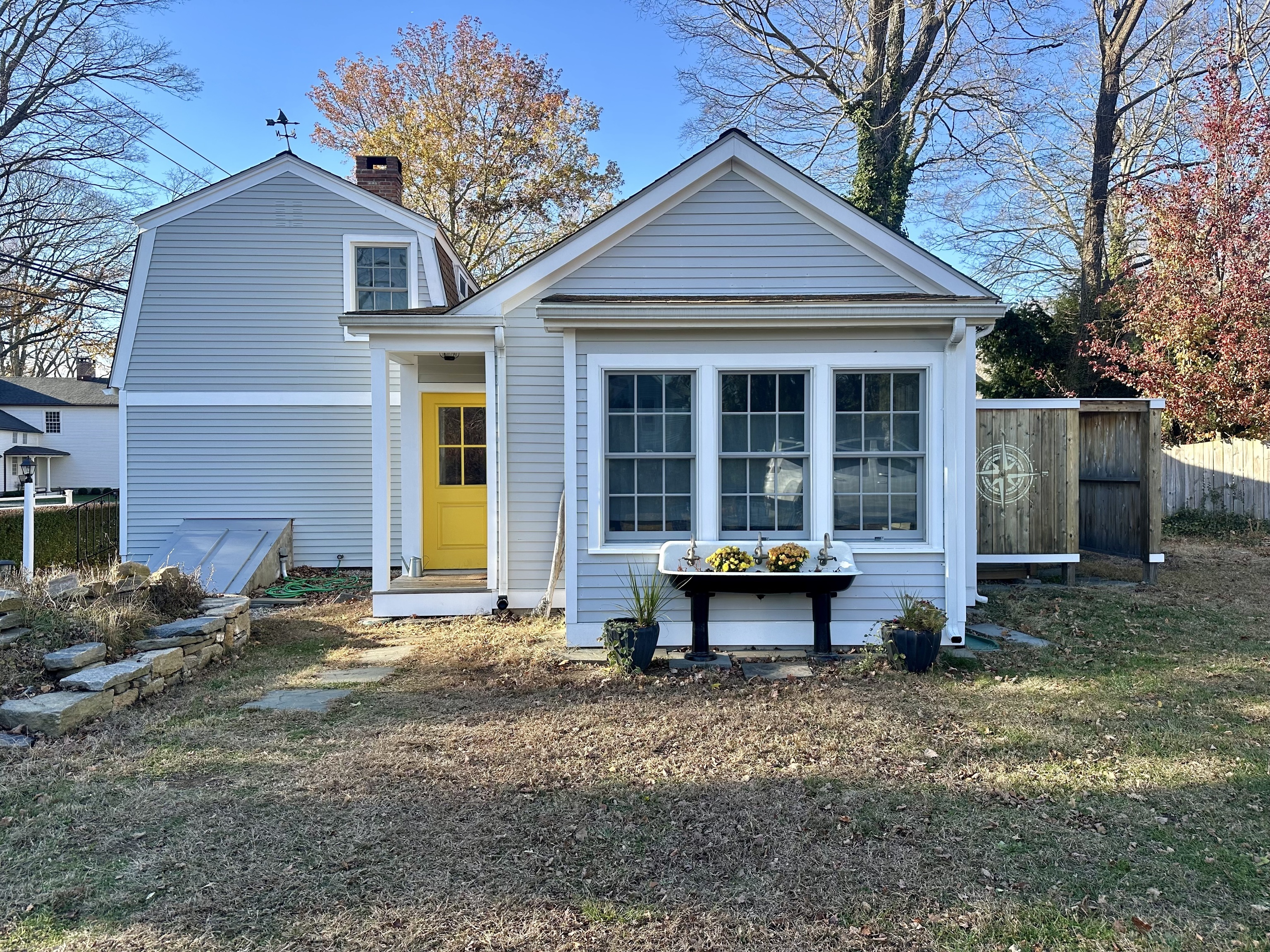 a view of a house that has a patio