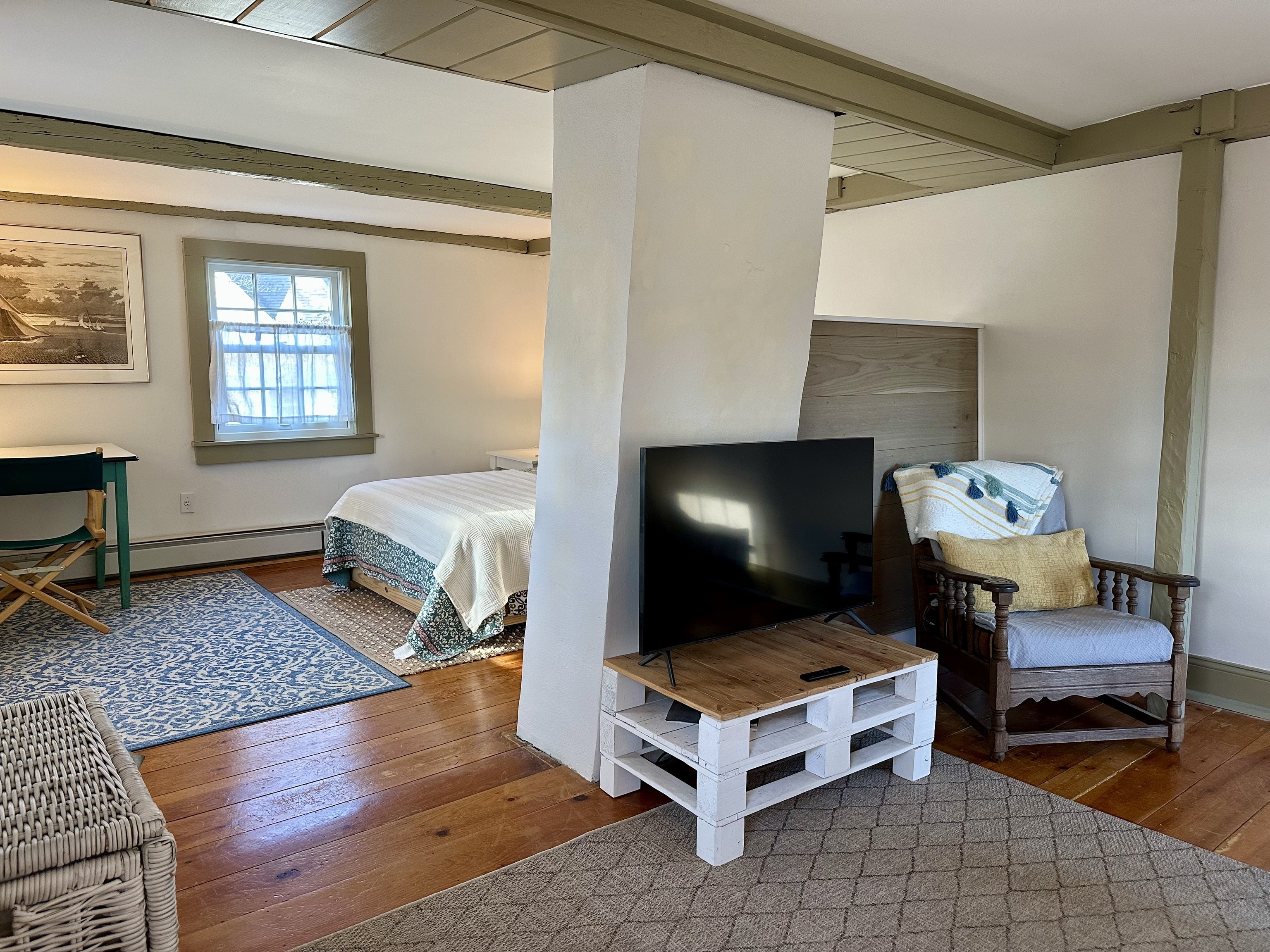 43 Pennywise Lane Old Saybrook, CT 06475 - Photo 29 of 31 a living room with furniture and a flat screen tv