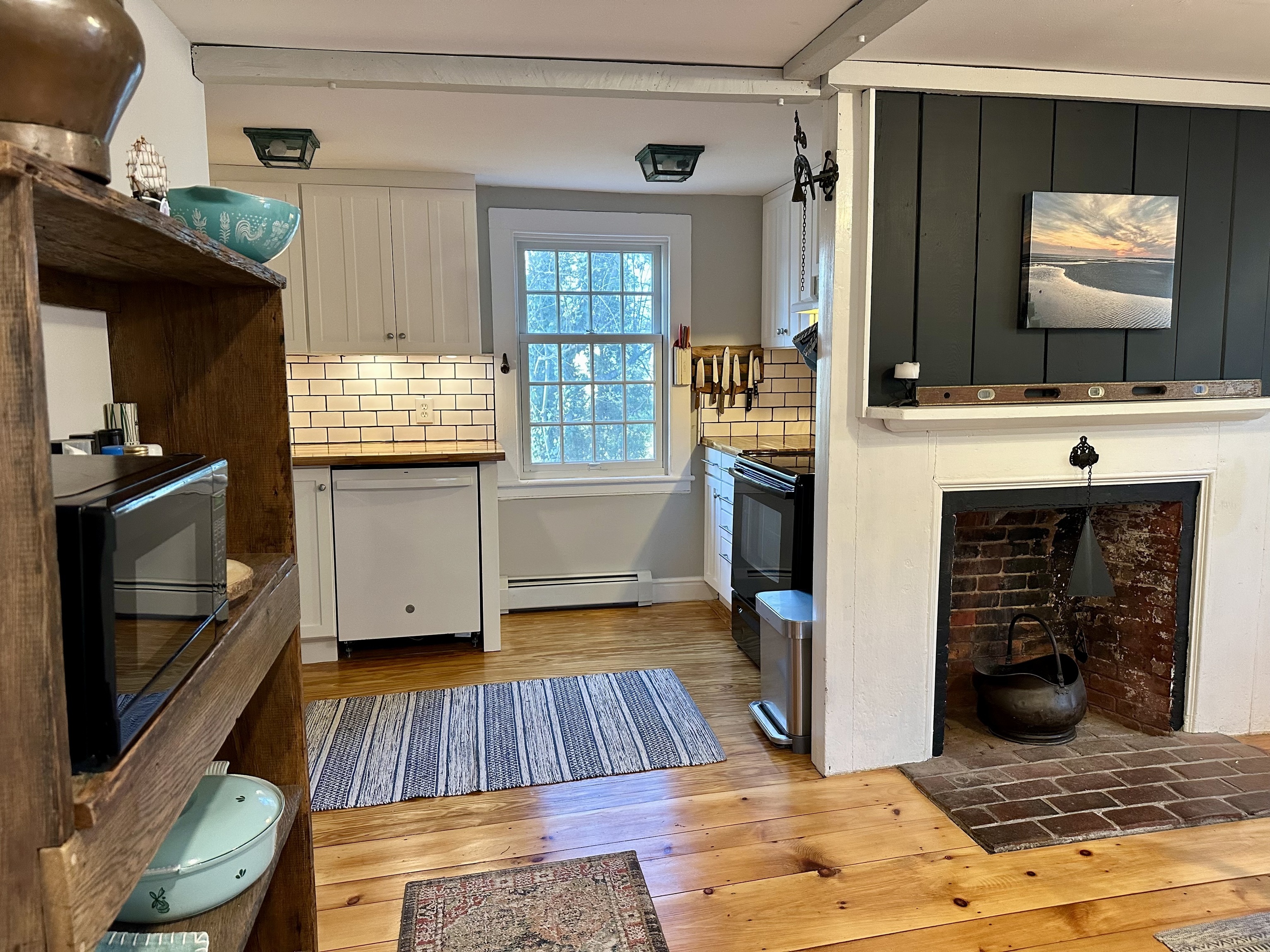 43 Pennywise Lane Old Saybrook, CT 06475 - Photo 7 of 31 a kitchen with sink and cabinets