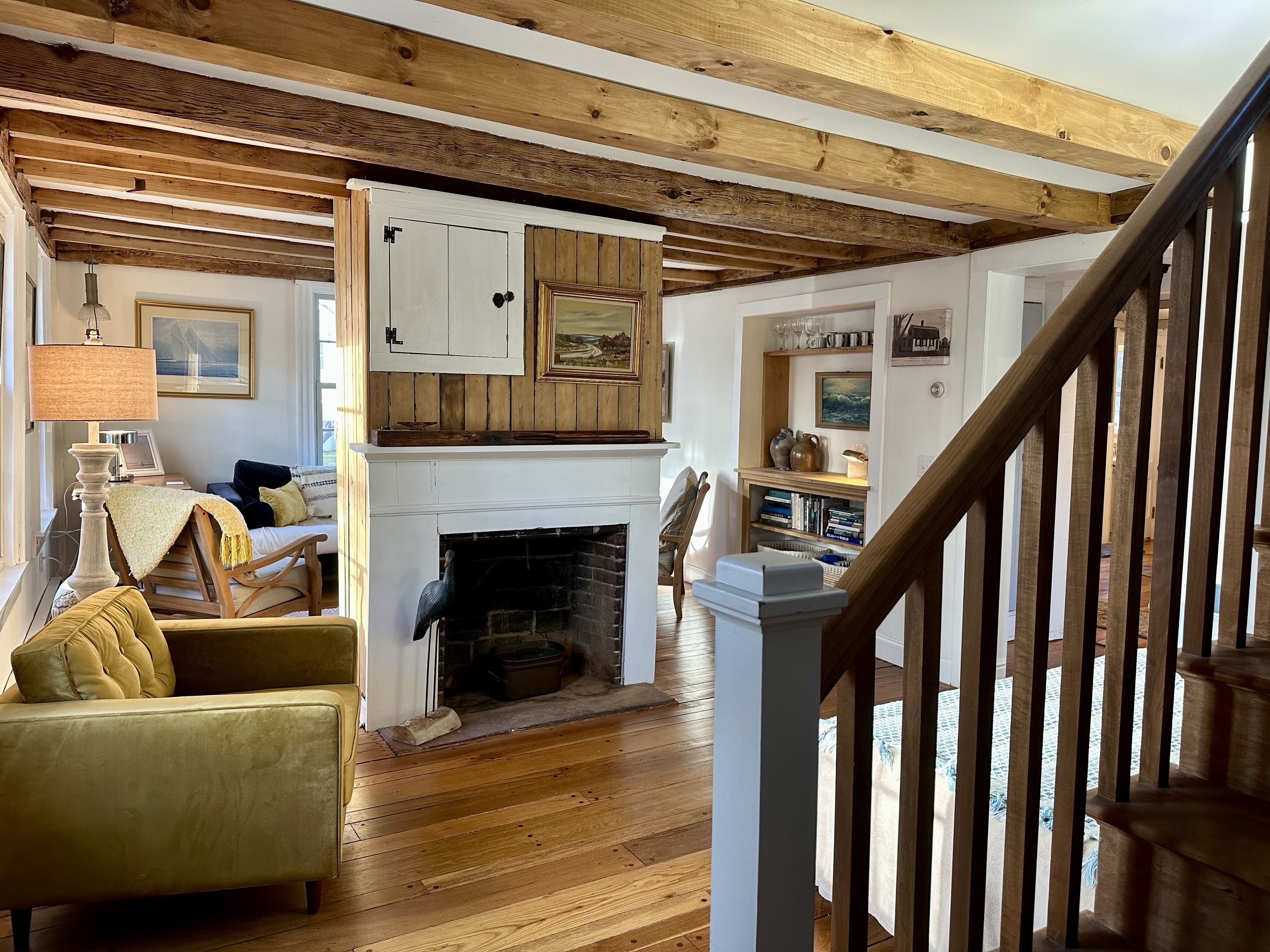 43 Pennywise Lane Old Saybrook, CT 06475 - Photo 10 of 31 a living room with furniture and a fireplace
