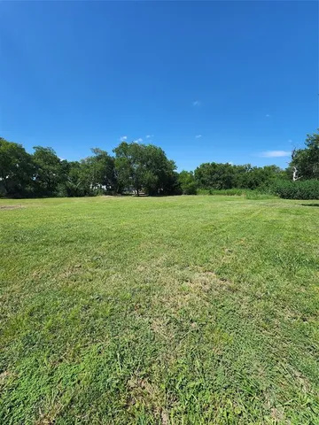 a view of an outdoor space and a yard