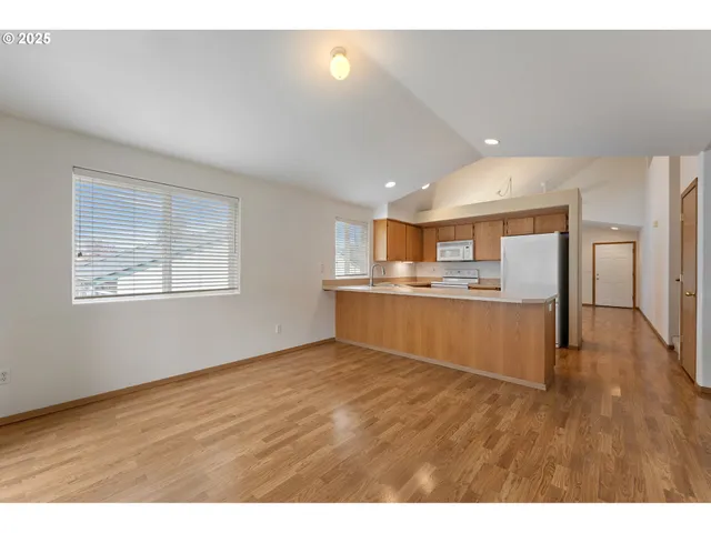 a view of kitchen with wooden floor