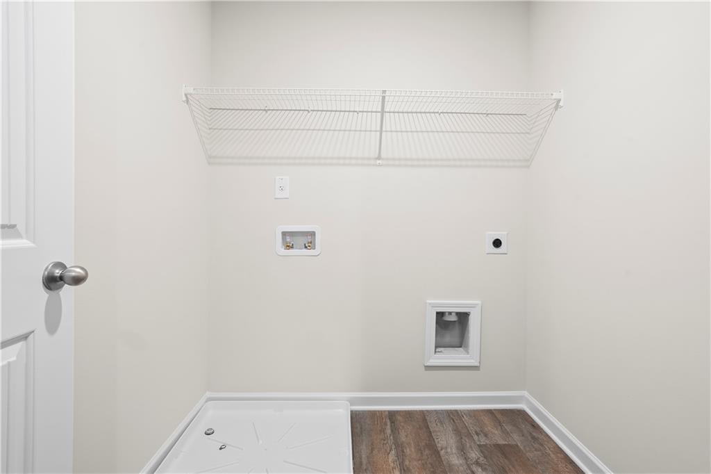 11531 Kimberly Court Hampton, GA 30228 - Photo 27 of 29 a view of a small space with racks on the wall