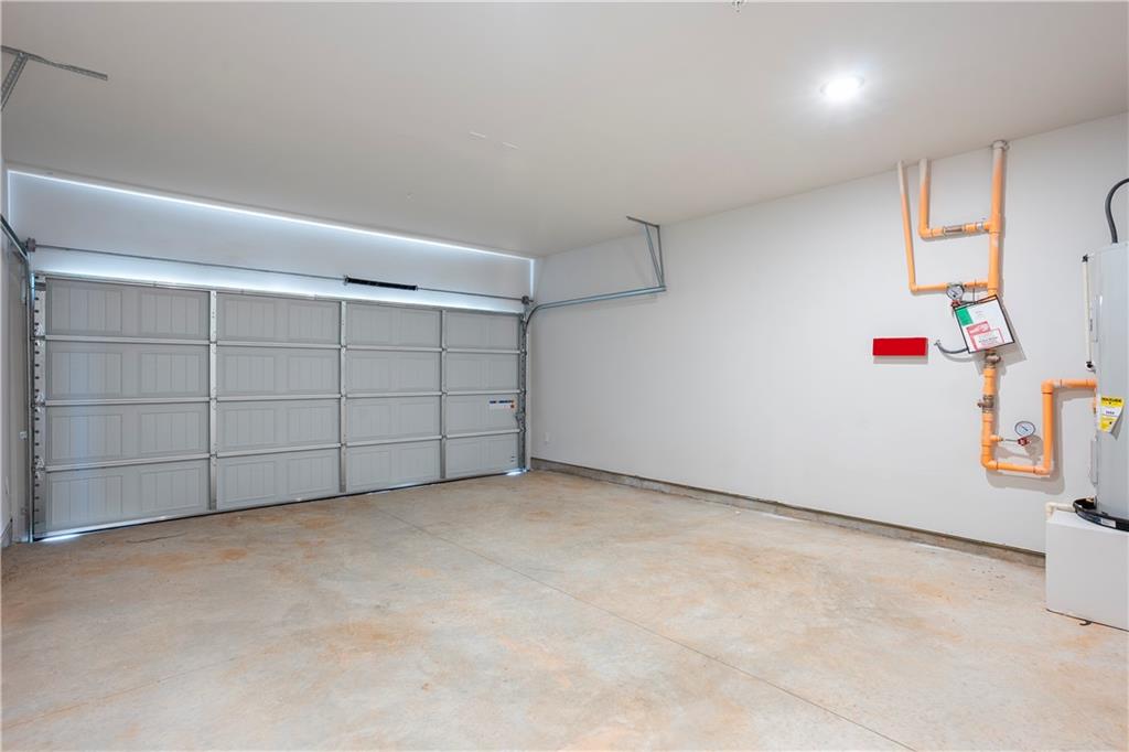 11531 Kimberly Court Hampton, GA 30228 - Photo 29 of 29 an empty room with cabinet